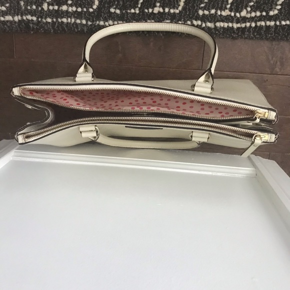 KateSpade handbag- true ivory color. 15 ‘ long. Used once.
